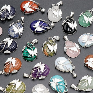 Natural crystal teardrop pendants with enamel butterfly inlay in assorted colors