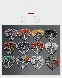 Macro view of twelve assorted natural gemstone heart tree of life wire wrapped pendants