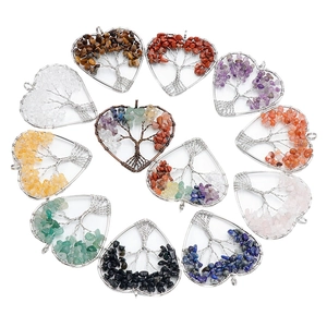 Handmade heart-shaped Tree of Life pendants with natural crystal stones and copper wire