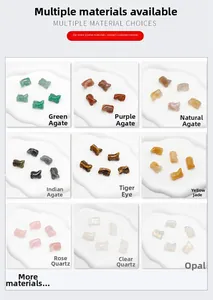 Detailed grid of hand-carved lizard figurines in various natural gemstones and crystals