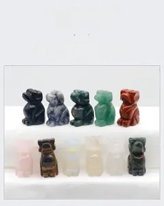 Macro shot of assorted natural crystal and agate stones carved in cute dog shapes