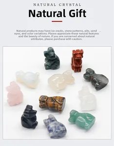 Detailed set of 11 natural crystal dog figurines including rose quartz and tiger eye