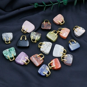 Miniature crystal handbag charms in rose quartz and lapis with gold metal handles
