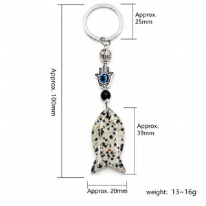 Fish-shaped agate stone keychain with Hamsa Hand and Evil Eye charm for bag decoration