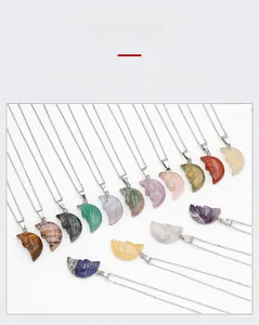 Detailed carved crescent moon face pendants in various natural crystal stones and minerals