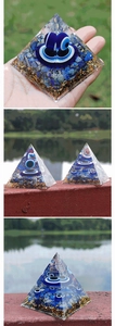 Detailed view of Evil Eye Orgone Pyramid with Lapis Lazuli and gold leaf resin casting
