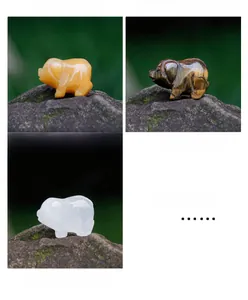 Macro view of hand-carved natural crystal mini pig figurines in various gemstones
