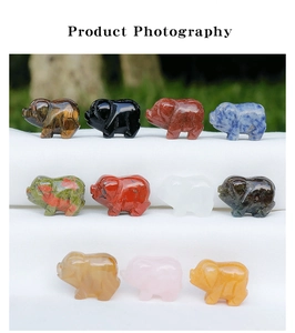 Collection of various 1-inch natural crystal gemstones carved into mini pig shapes