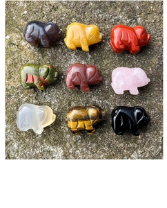 Set of nine hand-carved natural crystal mini pigs in obsidian, quartz and agate