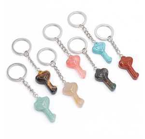 Set of seven natural crystal stone heart-engraved keychains in various polished gemstones