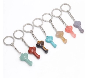Set of 7 heart-shaped natural crystal and agate keychains in various colorful gemstones