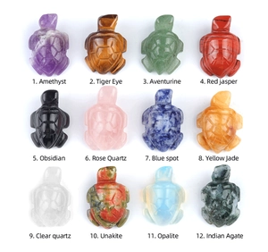Detailed set of 12 natural crystal sea turtle figurines in various gemstones like amethyst