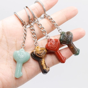 Set of four natural stone heart-shaped keychains featuring custom 520 engravings