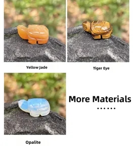 Polished turtle figurines carved from natural tiger eye, yellow jade, and opalite stone