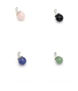 Detail view of Rose Quartz, Obsidian, Sodalite and Aventurine sphere crystal pendants