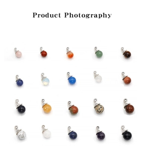 Variety of natural crystal and agate ball pendants with silver swirl metal caps