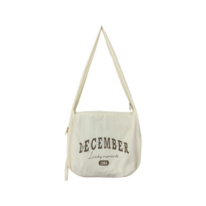 Sac bandoulière en nylon beige au style vintage pour le trajet quotidien