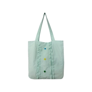 Sac fourre-tout en nylon vert menthe avec volants et boutons colorés sur fond blanc