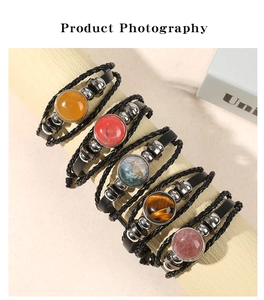 Detail of five-piece Bohemian multilayer braided bracelets with colorful crystal stones