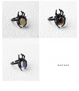 Gothic spider rings featuring natural Yellow Jade, Tiger Eye, and Opalite gemstones