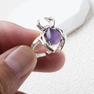 Silver punk spider ring with teardrop purple crystal stone and adjustable band