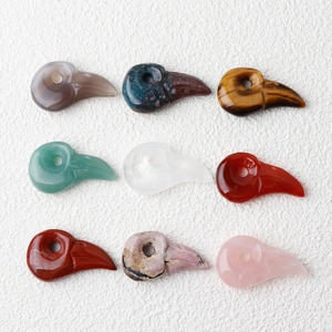 Carved natural stone bird skull pendants in tiger eye rose quartz and agate assortment