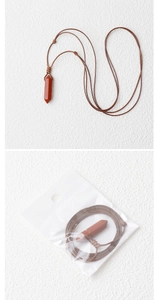 Red jasper hexagonal crystal pendant with adjustable brown braided cord and OPP bag