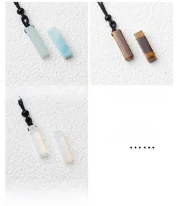 Detailed views of amazonite, tiger eye, and opalite rectangular stone pendant necklaces