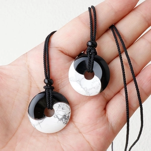 Yin Yang Tai Chi necklace with natural obsidian and white turquoise stone pendants
