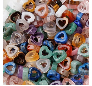 Macro shot of assorted heart-shaped gemstone beads for DIY jewelry making and bracelets