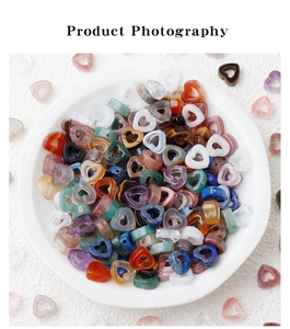Macro shot of assorted heart shaped hollow natural stone beads for DIY jewelry making
