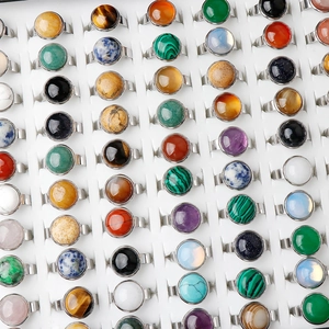 Wholesale display of 15mm gemstone rings featuring amethyst and agate in steel settings