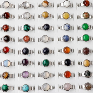 Top view of 40-piece assorted 11mm natural gemstone rings in silver stainless steel mounts