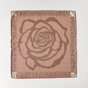 Silk wool square scarf with rose print and tassel edges in beige and coral