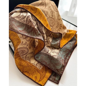 Retro paisley print square silk scarf with yellow and green patterns and hand-rolled edges