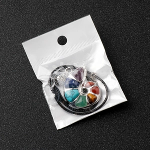 Pendentif spirale nautile avec incrustation de sept cristaux naturels chakra