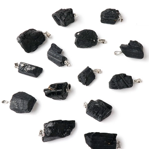 Natural black tourmaline raw stone pendants with silver metal bails in irregular shapes