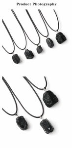 Detailed view of irregular natural black tourmaline raw stone pendants with woven cords