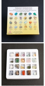 Detailed collection of 24 natural raw gemstones in a white display tray with box