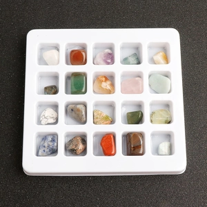 20-piece natural healing crystal stone collection set in a white grid display tray