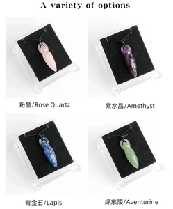 Detail view of goddess totem crystal pendants in rose quartz and amethyst stones