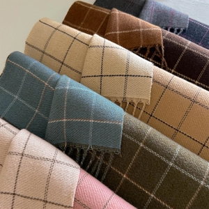 Plaid tassel scarf for women in multiple colors featuring soft faux cashmere fabric