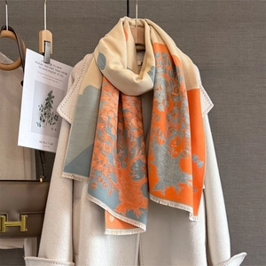Vintage leaf jacquard scarf in orange and beige cashmere-feel knit with fringe