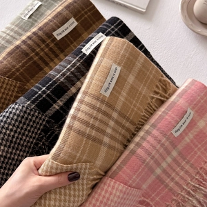 Classic checkered wool blend scarves in multiple colors with elegant tassel fringe details