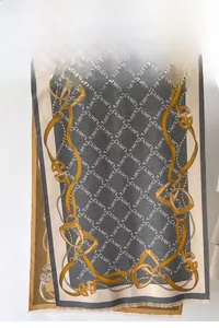 Detail of autumn winter scarf showing equestrian chain patterns and thick jacquard texture