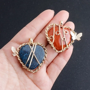 Natural heart stone necklace with gold wire wrap and butterfly pendant charm details