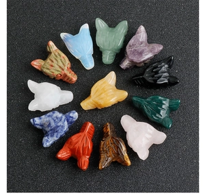 Detailed collection of assorted natural crystal and gemstone carved animal wolf heads