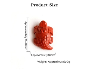Detailed view of hand-carved red stone turtle showing shell texture and dimensions