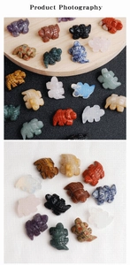 Detailed view of hand-carved natural amethyst and tiger eye gemstone crocodiles