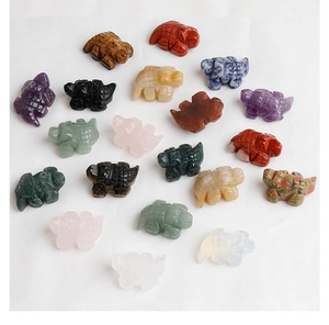 Detailed collection of small hippos hand-carved from various natural colorful gemstones